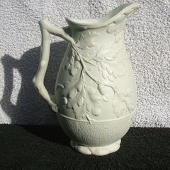 An antique Parian-bisque jug with moulded oak leaves & acrons pattern (c.1870)