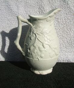 An antique Parian-bisque jug with moulded oak leaves & acrons pattern (c.1870)
