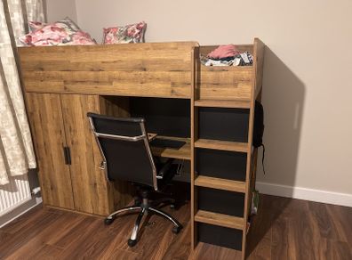 bunk bed with table and wardrobe