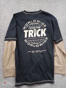 NEW.boy's top. Age 10/11