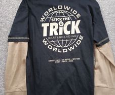 NEW.boy's top. Age 10/11
