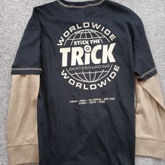 NEW.boy's top. Age 10/11