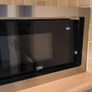 For sale: Beko MGB25332BG built-in microwave with grill, stainless steel finish. Image 4