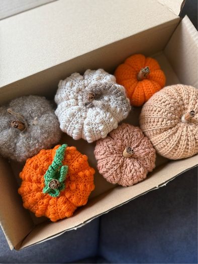 Box of crochet colourful pumpkins