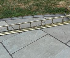Antique brass fire fender
