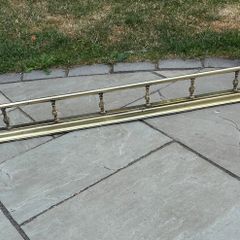 Antique brass fire fender