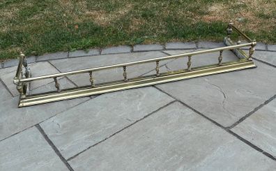 Antique brass fire fender