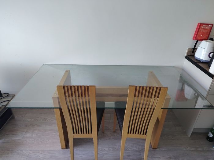 Grey fabric sofa and glass top dining table set