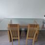 Grey fabric sofa and glass top dining table set Image 2