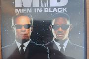 Men in Black movie DVDs.