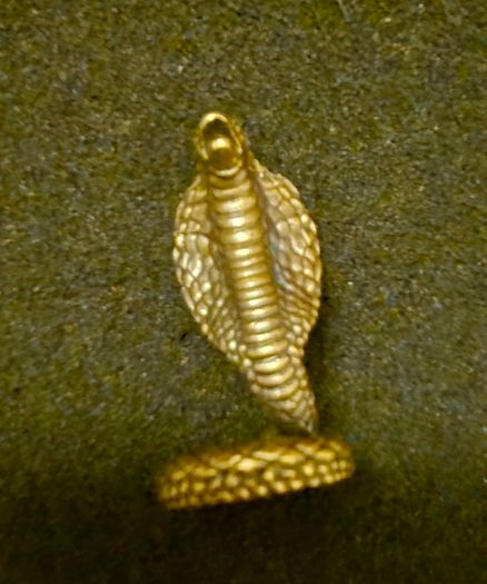 3 brass snakes.
