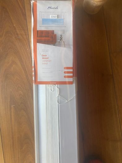 White wooden blinds