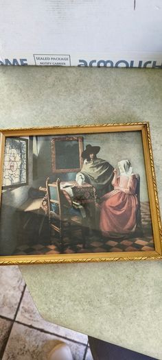 2 framed art work- 1- Vermeer's The Glass of Wine Fine Art Print -  Classic Wall Decor . 25.00euro.2- Helmsley Yorksire Colin Williamson Watercolour 35.00 euro.