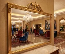 Very nice and large gilt framed mirror.