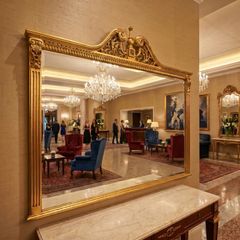 Very nice and large gilt framed mirror.