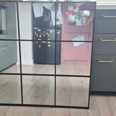 black framed mirror