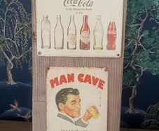 Two large rustic bar signs