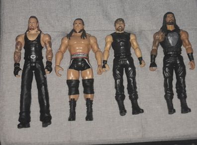 WWE Action Figures: Undertaker, Roman Reigns, Rusev, Dean Ambrose
