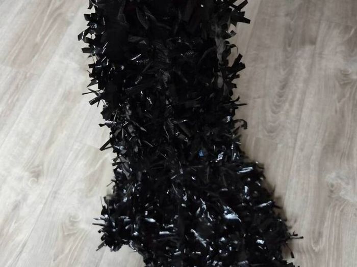 Black decorating tinsel, 23 meters