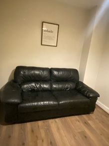 black 3 seater leather couch