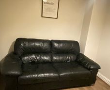 black 3 seater leather couch