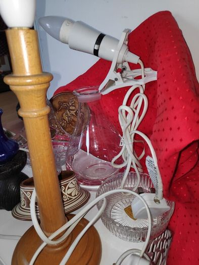 A bundle of household items including wooden table lamp, clip on light,crystal basket vase