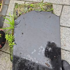 Black marble headstone