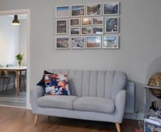 Two seater Eazy Living grey sofa