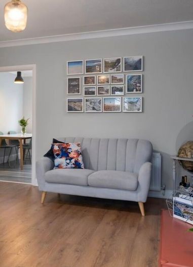 Two seater Eazy Living grey sofa