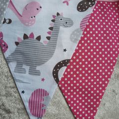 Dinosaur buntings . Blue and pink