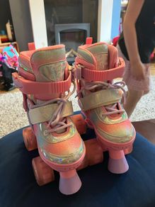 Pink rainbow light up roller skates. Sizes 9-12
