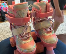 Pink rainbow light up roller skates. Sizes 9-12