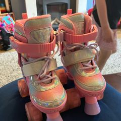Pink rainbow light up roller skates. Sizes 9-12