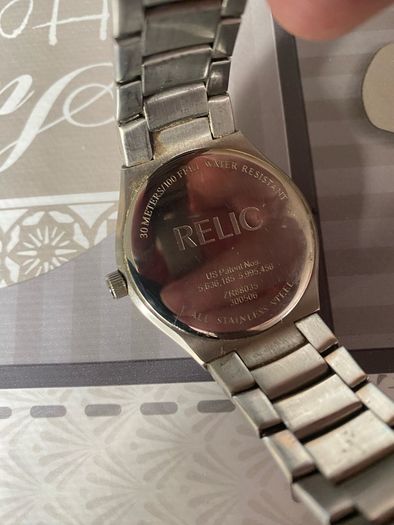 Relic face changing watch with broken watchstrap