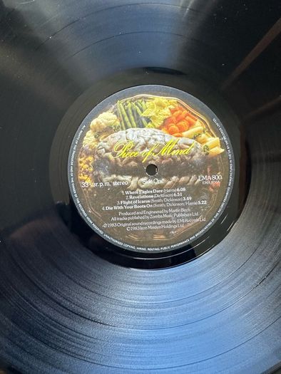Iron Maiden Original 1984 release piece of mind. Sleeve in vg+ condition. Vinyl is vg with scuff marks that doesn't affect sound quality
