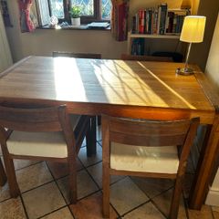 Habitat Radius Oak dining table and chairs for sale.