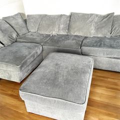 Grey corner sofa with matching footstool