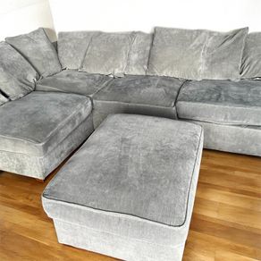 Grey corner sofa with matching footstool