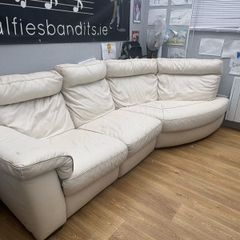 Cream leather sofa with electric recliner end