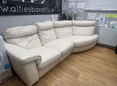 Cream leather sofa with electric recliner end
