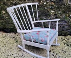 Mid-century painted spindle back rocking chair