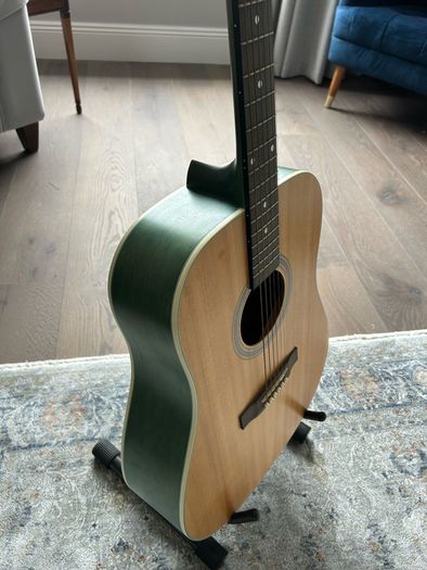Acoustic guitar with strap, bag, stand and accessories