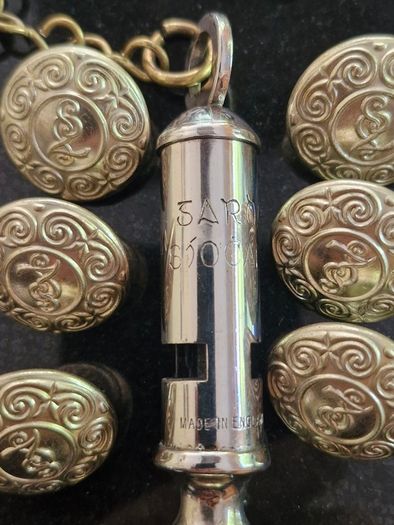 An Early Garda Siochana Whistle And Set Of 7 Buttons