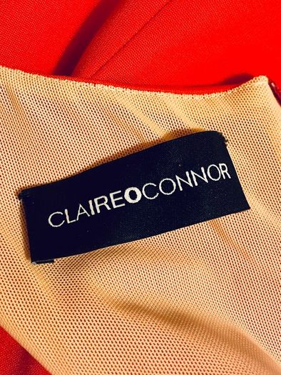 Stunning Claire O Connor luxury Irish designer dress in a bold, vibrant red.
