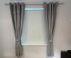 2 pairs crushed velvet eyelet curtains.