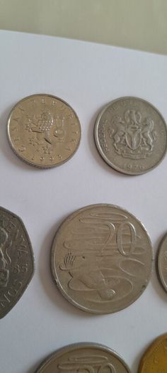 Coins a mix of different countries 28 coins in total registered post included