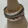 Handmade sterling silver fidget spinner ring with copper. Image 3