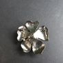 Flower-shaped Brooch with black and white crystals Image 2