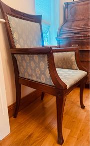 Elegant traditional upholstered mahogany armchair