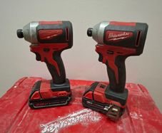 2 Milwaukee impact drivers with batteries